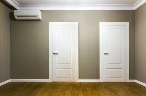 Comparison of a room in an apartment before and after renovation works. New house interior with plastered and painted walls, white doors and wooden oak floor. Real estate development concept.
