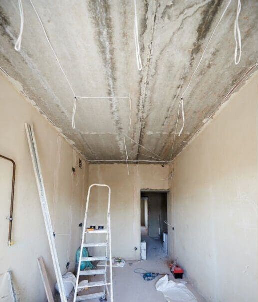Comparison snapshot of a big beautiful room in a private house before and after reconstruction, messy room with empty grey walls vs new clean shiny interior