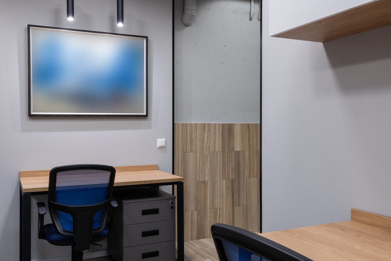 Finished office interior with wall base and panel detail, Austin, TX